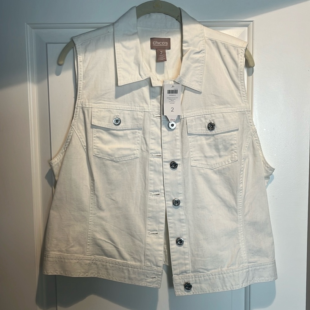 White sleeveless vest